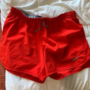 Red NIKE shorts